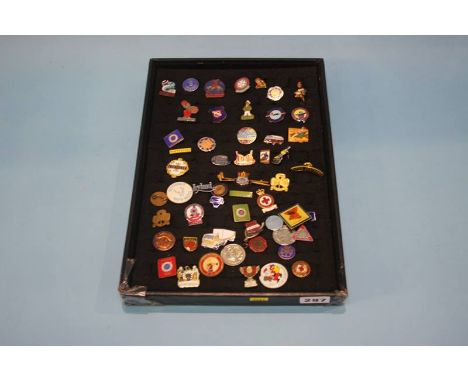 Collection of various enamel badges, including Butlins etc.