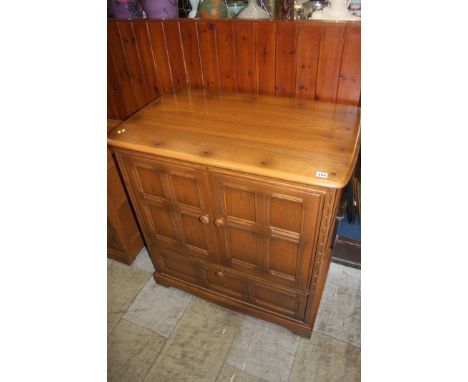 An Ercol TV cabinet