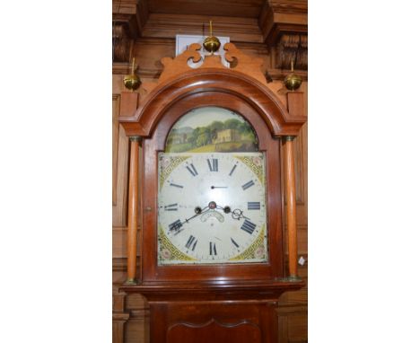 An eight day Mahogany cased longcase clock with enamelled broken arch dial, depicting a Georgian country house in English lan