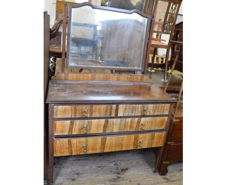 A mirrored dressing table and a commode