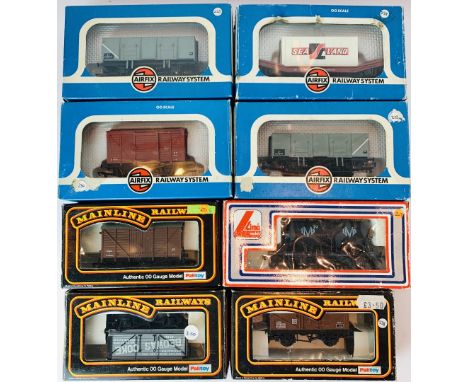 Eight assorted Mainline / Airfix / Lima OO Gauge freight wagons all boxed