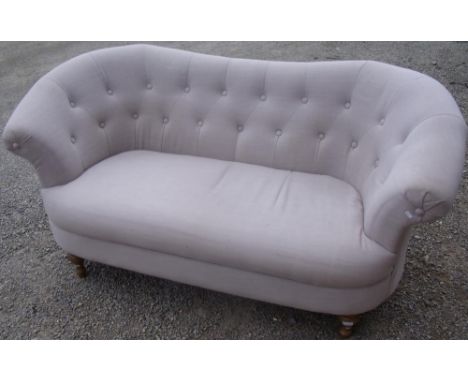 Modern Victorian style two seat sofa with upholstered seat and deep button back, on light wood turned supports (width 170cm) 