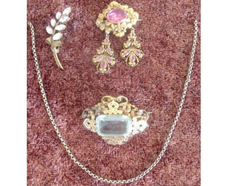 Selection of Victorian dress jewellery including an elaborate gilt metal embossed brooch with hanging pendant set with amethy