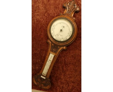 Carved oak cased wall barometer by R &amp; J Beck Ltd 66 Cornhill London 