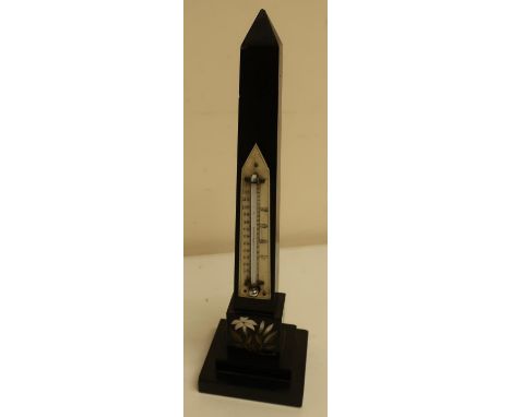 Late victorian black slate Pietra Dura obelisk thermometer (26.5cm high) with floral detail and stepped base (slight chips) 