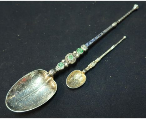 A large Birmingham silver hallmarked and enamel anointing spoon and a similar smaller spoon (2) 
