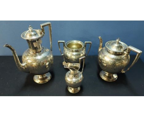 A Sheffield 1879 large and elaborate silver hallmarked tea service comprising of twin handle sugar bowl, milk jug, teapot and