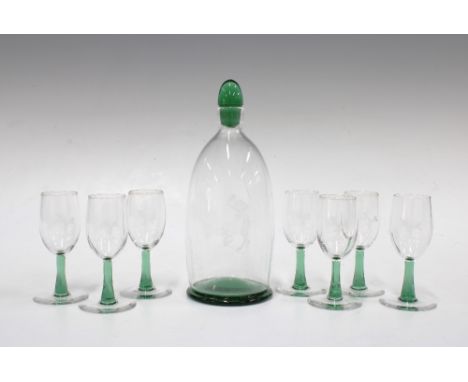 Orrefors glass liqueur set, the clear glass decanter with green footrim and stopper,   and set of seven glasses with engraved
