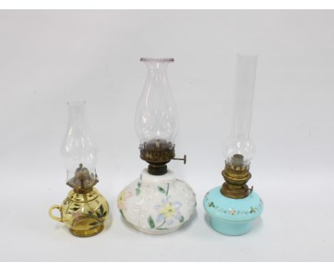 Three vintage glass oil lamps, tallest 40cm (3)
