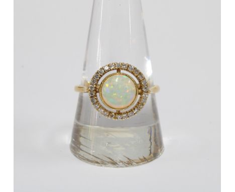 Opal and diamond dress ring set in 18ct gold 