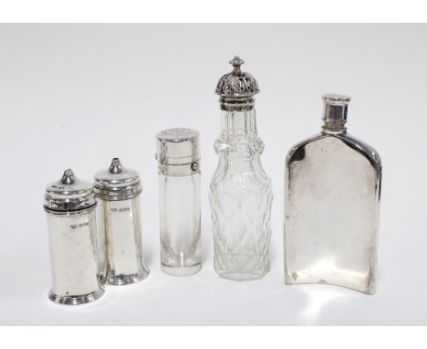 Edwardian silver salt and pepper pots, Sheffield 1909, Victorian silver topped glass jar, London 1879, a white metal hip flas