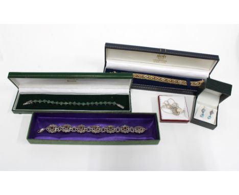 A collection of silver and costume jewellery to include earrings, bracelets, necklace, etc