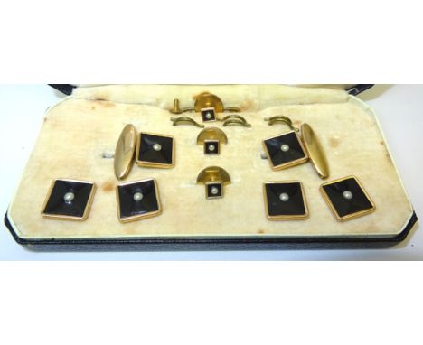 A set of rolled gold Dress Studs and Cufflinks, each set with a single pearl on a black background, other Cufflinks, a Norweg