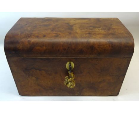 A Victorian walnut dome topped Tea Caddy the interior fitted with two covered containers.  9" (23cms) wide. 