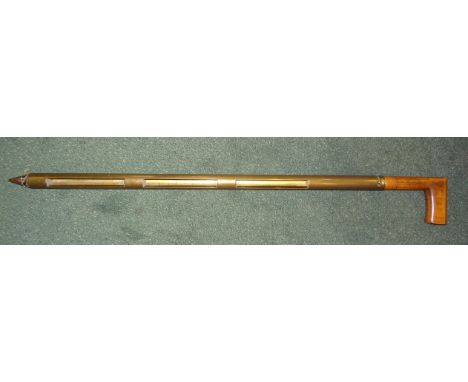 A brass Grain Sampling Stick by W Reeves & Company Limited, London, with three apertures and wooden crook handle.