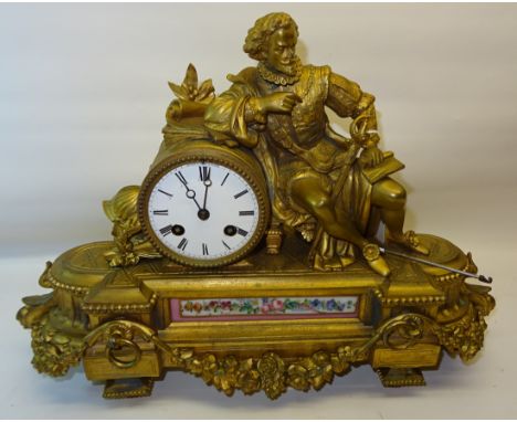 A 19th century French Mantle Clock with white dial in gilded spelter case, inset with a floral painted porcelain panel, 15" (