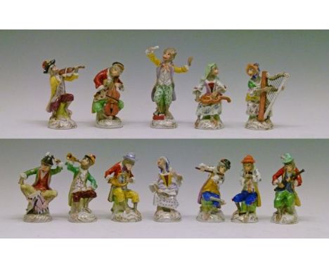 Carl Thieme porcelain twelve piece monkey band, after Meissen, height of conductor 17cm  Condition: Drum playing monkey has p