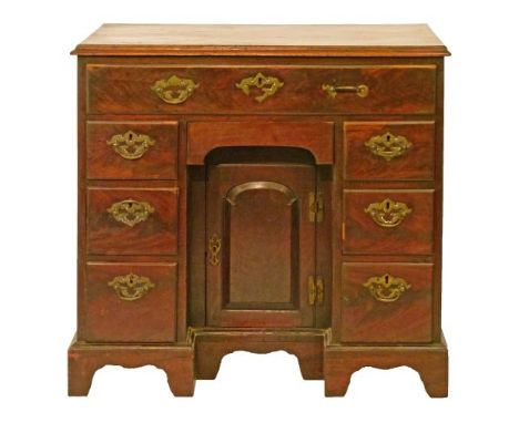 Mid 18th Century mahogany kneehole dressing table fitted one long drawer and three box drawers to each pedestal, the kneehole