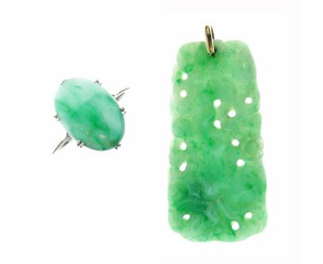 Jade panel pendant, carved as fruit, approximately 4.4cm long, with a jade single stone ring stamped 'Plat 9ct', the cabochon