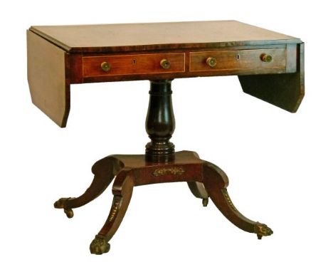 Regency inlaid and crossbanded rosewood two flap sofa table, the flaps with canted corners, fitted two real and two dummy dra