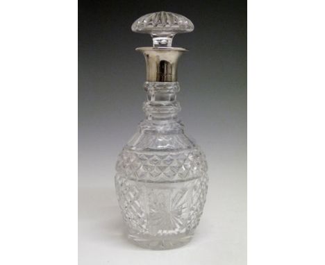 Baluster shaped cut glass decanter having a mushroom stopper, the silver collar hallmarked for R.F.Mosley & Co, Sheffield 192