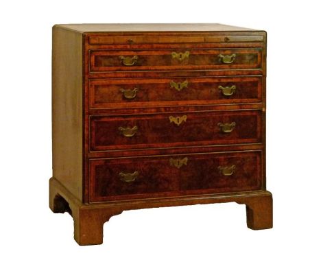 18th Century walnut chest of four long graduated drawers, the top with herringbone inlay and crossbanding, fitted brushing sl