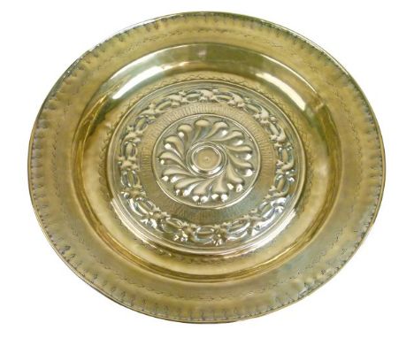 Antique German embossed and engraved brass alms dish, possibly Nuremberg, having a central boss, within a surround of German 