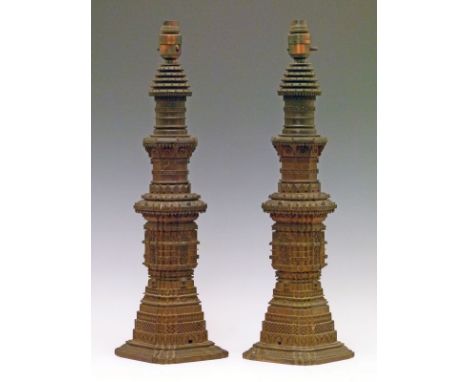 Pair of late 19th/early 20th Century Indian carved lamp bases, each in the form of an architectural tower, 46.5cm high  Condi