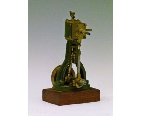Stuart Turner type vertical steam engine based on a model No 7A, finished in green, 19cm high  Condition: Wheels move freely,