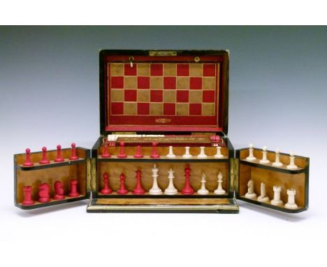 Victorian coromandel cased games compendium, the hinged cover and doors opening to reveal a satinwood fitted interior with bo