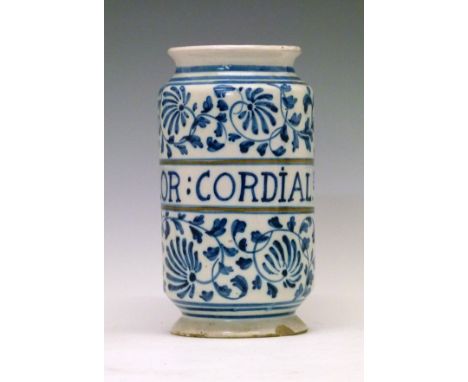Italian Majolica albarello of typical cylindrical form, cartouche with script 'FLOR:CORDIALs' within blue painted scrolling f