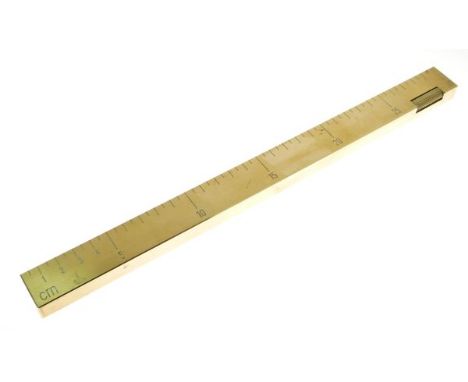 Dunhill brass 'Foot Long' gas cigarette lighter, engraved for both inches and centimetres, 30.5cm high  Condition: Light surf
