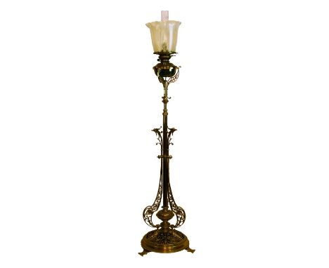 Late 19th/early 20th Century brass floor standing telescopic oil lamp, now converted to electricity, the pillar with wrought 