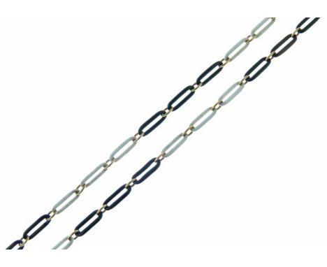 Unusual French enamel gold watch chain, of alternating trios of black and white links, with French control marks and numbered