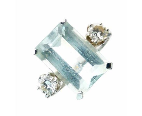 Aquamarine and diamond three stone ring, the white mount stamped '18ct', the step cut measuring approximately 12.9mm x 8.6mm 