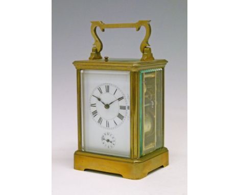Large French brass cased repeat carriage clock, white enamel dial with Roman numerals and subsidiary alarm dial, 13.5cm high 