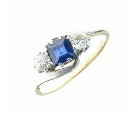 Sapphire and diamond three stone ring, stamped '18ct Plat', the square cut flanked by two brilliant cuts totalling approximat