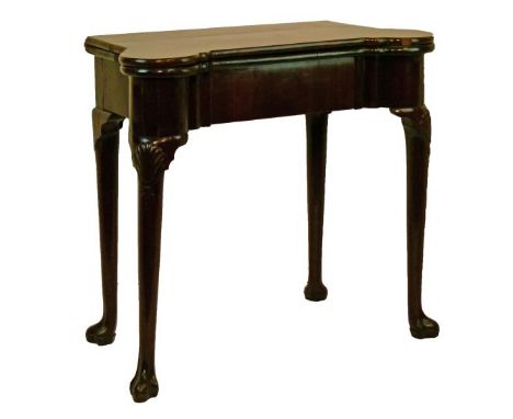 George III mahogany shaped top fold over card table, opening to reveal a baize top with wells, one drawer to the frieze and s