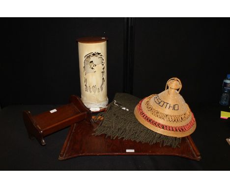 Lap tray with folding supports, 61cm wide, mahogany book trough, 30.5cm wide, Lesotho souvenir hat and blanket, lamp with car