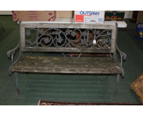 Cast metal and hardwood garden bench, with pierced foliate back and slatted seat, 125cm wide