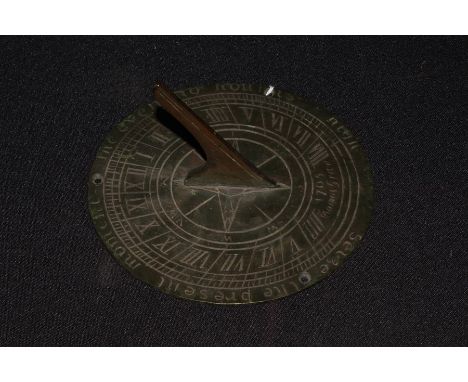 Georgian style sundial, the outer rim cast "seize the present moment the evening hour is nigh", 15cm diameter
