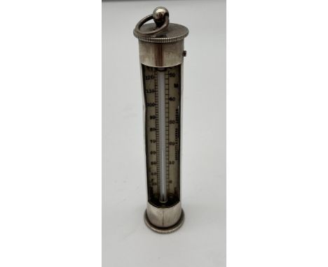 A London silver pocket thermometer. produced by. Negretti &amp; Zambra London. [11cm in height]