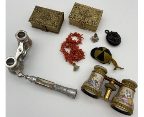 Two gilt brass jewel boxes, Mother of pearl opera glasses, Ceramic opera glasses, coral necklace, jet pendant and small jocke