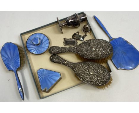 A Selection of silver dressing table items to include brushes and hand mirror etc 