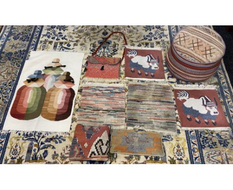 A Selection of hand woven prayer rugs, two cushions and pouffe. 