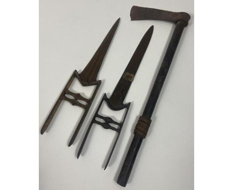 Two Antique Persian Katar Knives/ daggers together with a possible African tribal axe. 