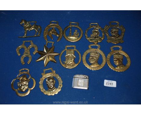A quantity of Royal Commemorative Horse brasses, 1907, 1935, 1936, etc and a QEII souvenir Lighter.