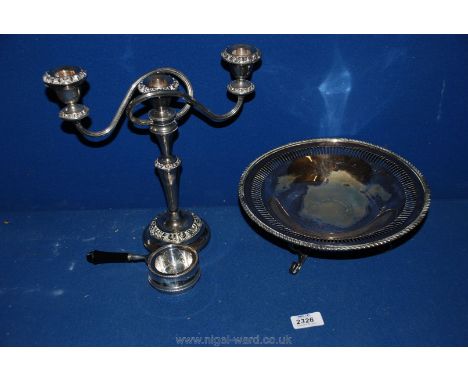 A plated Candelabra, tripod fruit basket and tea strainers