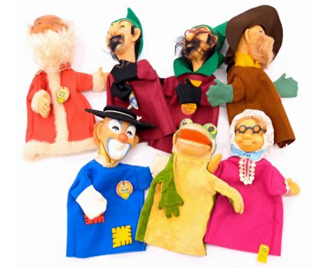 Steiff felt hand puppet group including: (1) Santa Claus; (2-3)Magician; (4) Clown; (5) Grandmother; (6) Robber; (7) Froggy; 
