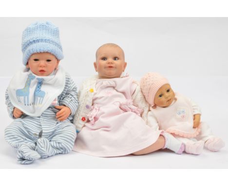 Three vinyl / silicone reborn realistic newborn baby dolls, includes: (1) Zapf Creation baby doll by Wiltrud Stein, signed on